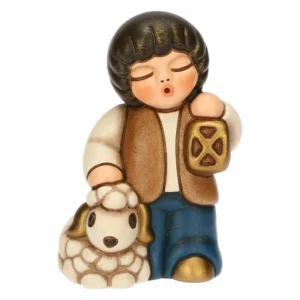 Bimbo con lanterna in ceramica Presepe Classico